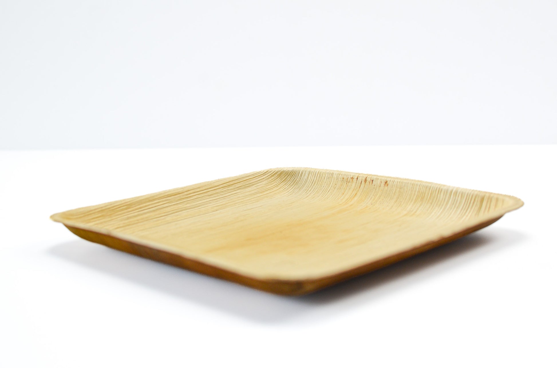 vierkant palmblad bord van 20 x 20 cm zijaanzicht